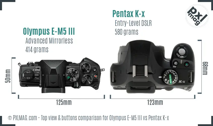 Olympus E-M5 III vs Pentax K-x top view buttons comparison