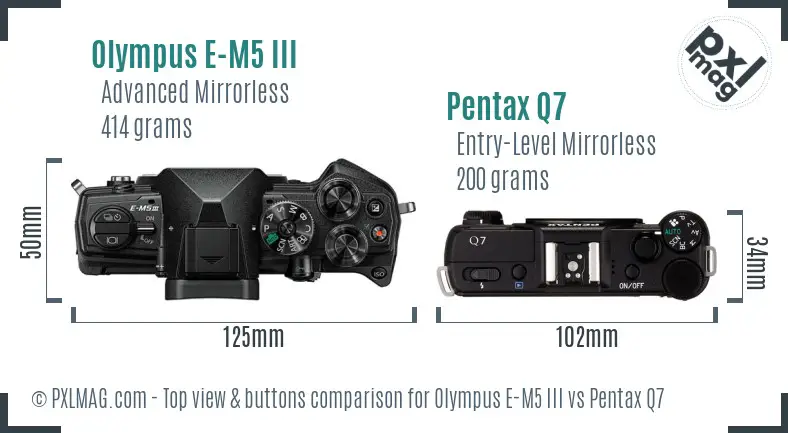 Olympus E-M5 III vs Pentax Q7 top view buttons comparison