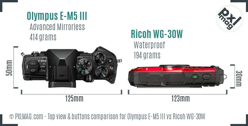 Olympus E-M5 III vs Ricoh WG-30W top view buttons comparison Olympus E-M5 III vs Ricoh WG-30W top view buttons comparison