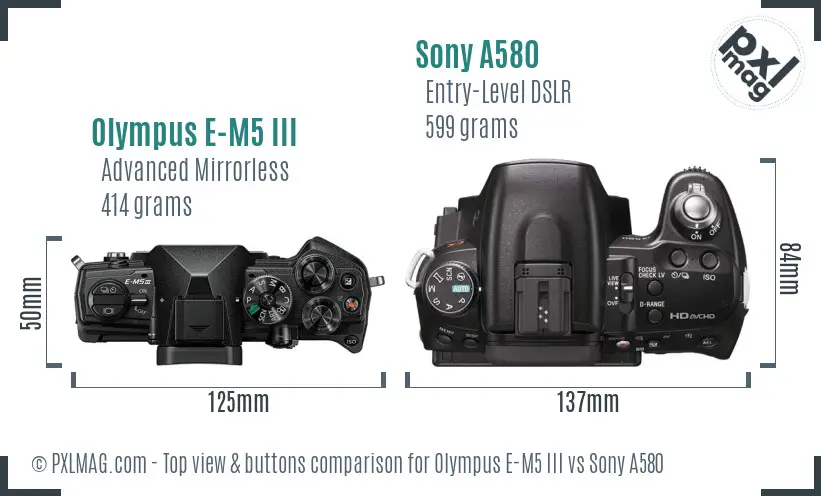 Olympus E-M5 III vs Sony A580 top view buttons comparison