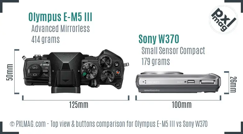 Olympus E-M5 III vs Sony W370 top view buttons comparison Olympus E-M5 III vs Sony W370 top view buttons comparison