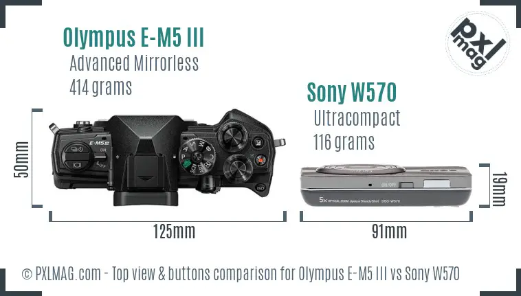 Olympus E-M5 III vs Sony W570 top view buttons comparison