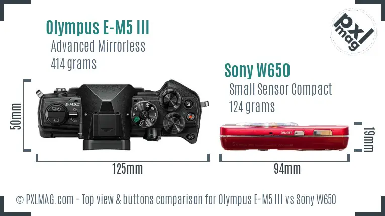 Olympus E-M5 III vs Sony W650 top view buttons comparison