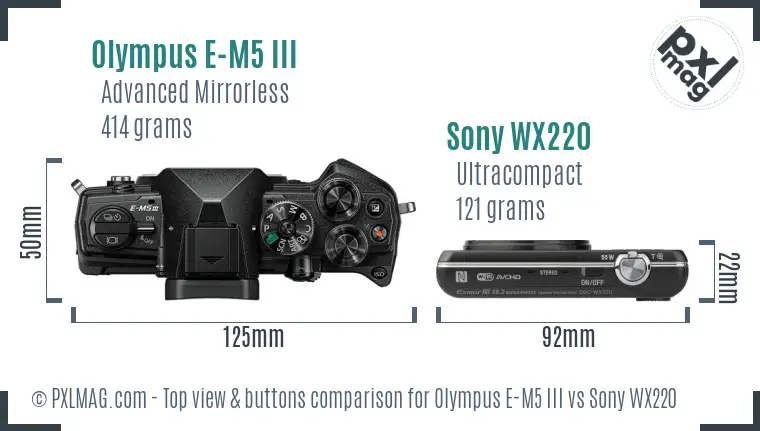 Olympus E-M5 III vs Sony WX220 top view buttons comparison