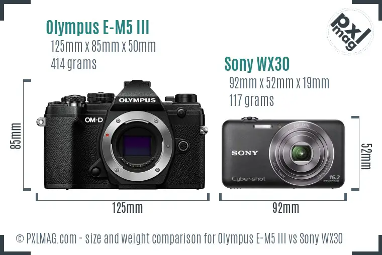Olympus E-M5 III vs Sony WX30 size comparison Olympus E-M5 III vs Sony WX30 size comparison