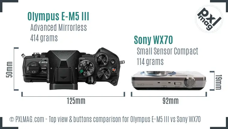 Olympus E-M5 III vs Sony WX70 top view buttons comparison Olympus E-M5 III vs Sony WX70 top view buttons comparison