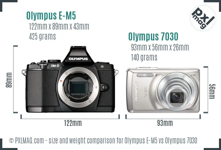 Olympus E-M5 vs Olympus 7030 size comparison