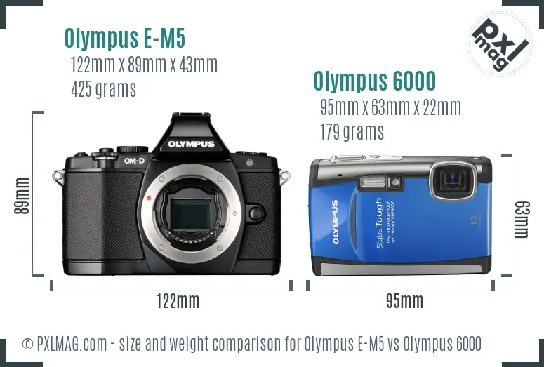 Olympus E-M5 vs Olympus 6000 size comparison