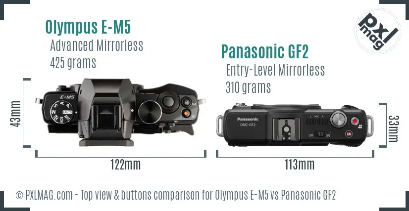 Olympus E-M5 vs Panasonic GF2 top view buttons comparison