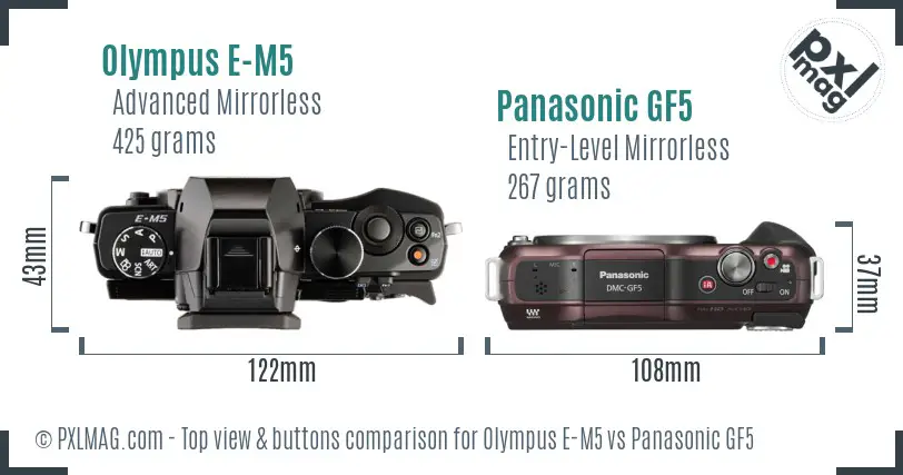 Olympus E-M5 vs Panasonic GF5 top view buttons comparison