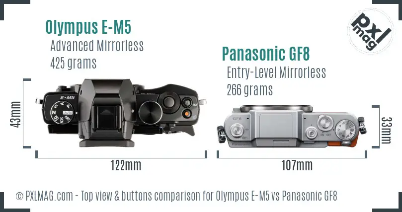 Olympus E-M5 vs Panasonic GF8 top view buttons comparison