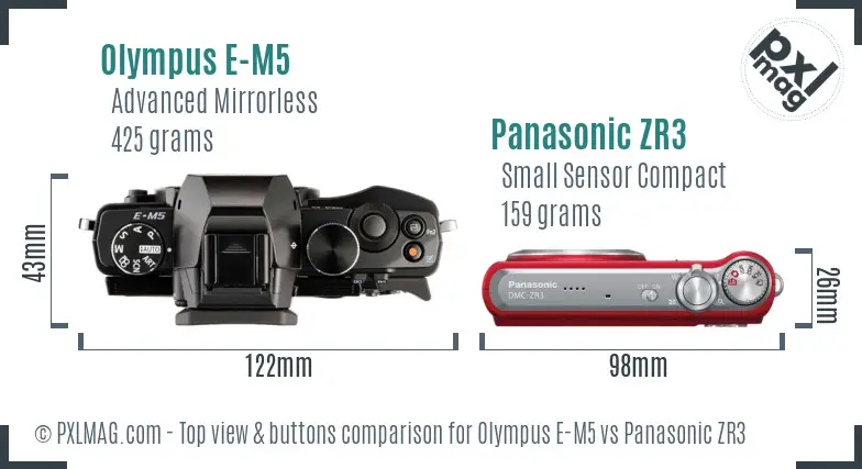 Olympus E-M5 vs Panasonic ZR3 top view buttons comparison