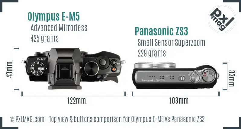 Olympus E-M5 vs Panasonic ZS3 top view buttons comparison