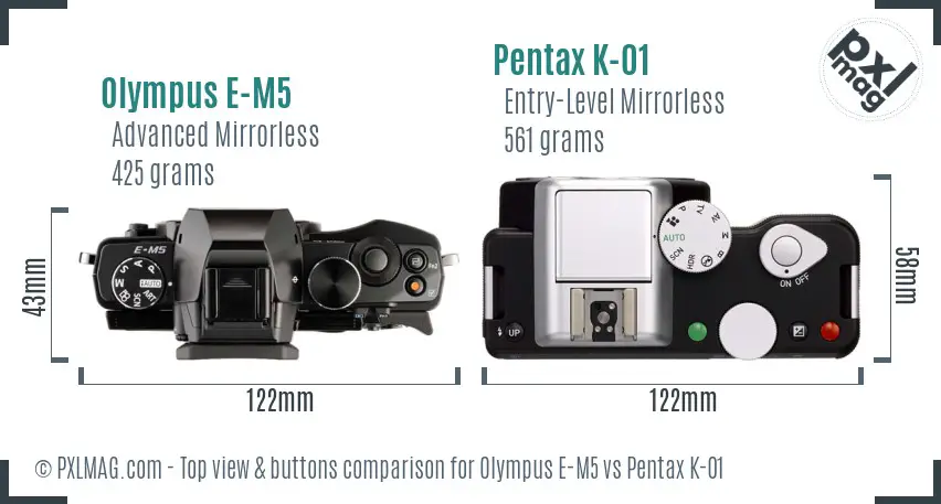 Olympus E-M5 vs Pentax K-01 top view buttons comparison