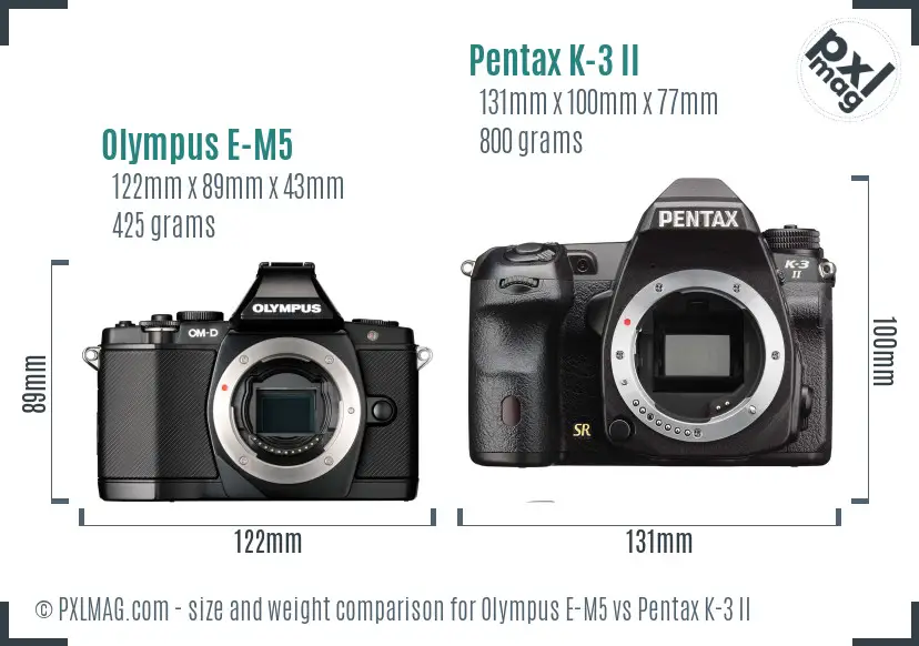 Olympus E-M5 vs Pentax K-3 II size comparison