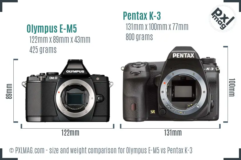 Olympus E-M5 vs Pentax K-3 size comparison