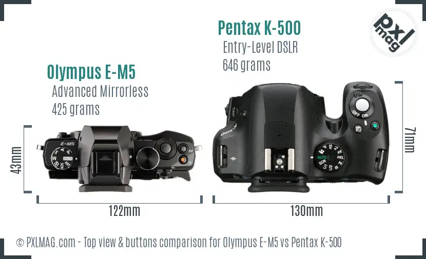 Olympus E-M5 vs Pentax K-500 top view buttons comparison