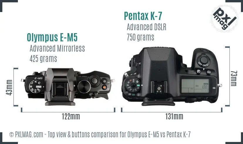 Olympus E-M5 vs Pentax K-7 top view buttons comparison