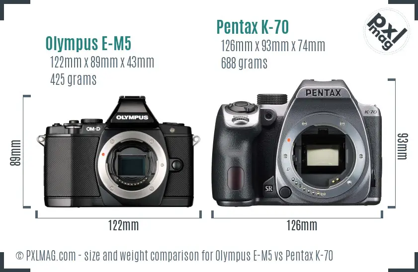 Olympus E-M5 vs Pentax K-70 size comparison