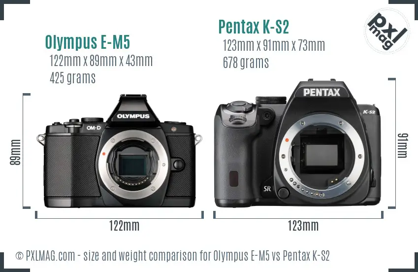 Olympus E-M5 vs Pentax K-S2 size comparison