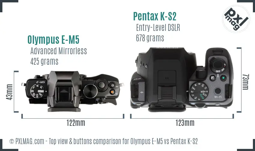 Olympus E-M5 vs Pentax K-S2 top view buttons comparison