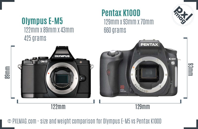 Olympus E-M5 vs Pentax K100D size comparison