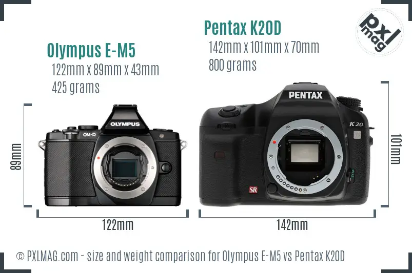 Olympus E-M5 vs Pentax K20D size comparison