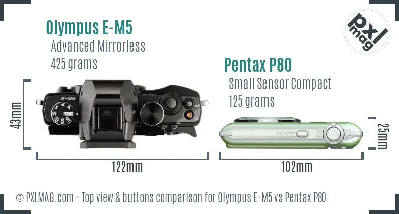 Olympus E-M5 vs Pentax P80 top view buttons comparison