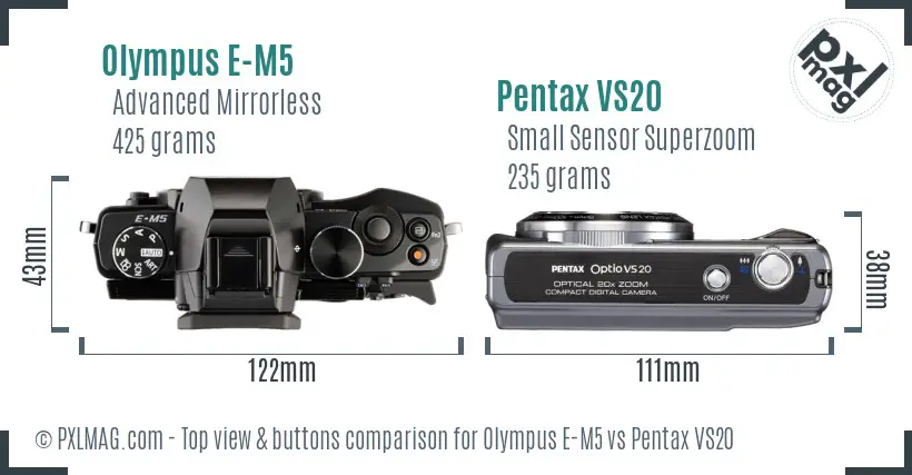 Olympus E-M5 vs Pentax VS20 top view buttons comparison