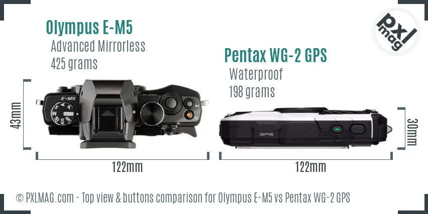 Olympus E-M5 vs Pentax WG-2 GPS top view buttons comparison