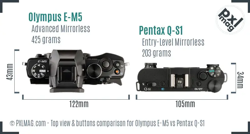 Olympus E-M5 vs Pentax Q-S1 top view buttons comparison