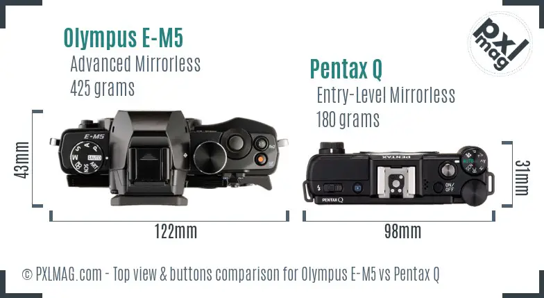 Olympus E-M5 vs Pentax Q top view buttons comparison