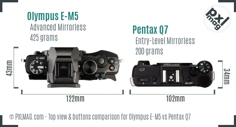 Olympus E-M5 vs Pentax Q7 top view buttons comparison