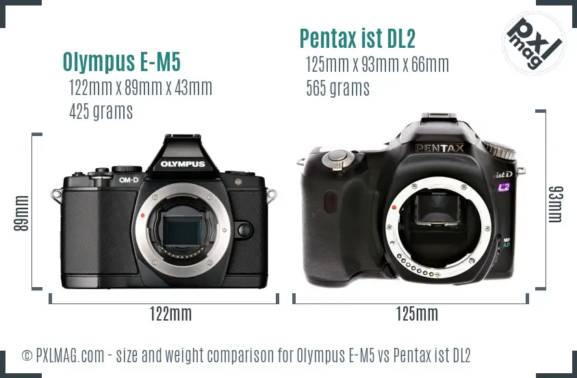 Olympus E-M5 vs Pentax ist DL2 size comparison