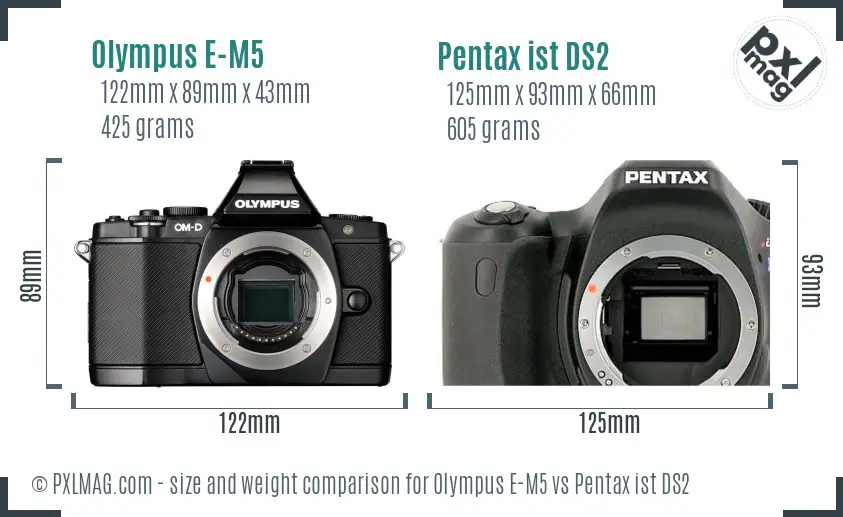 Olympus E-M5 vs Pentax ist DS2 size comparison
