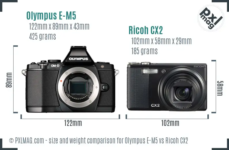 Olympus E-M5 vs Ricoh CX2 size comparison