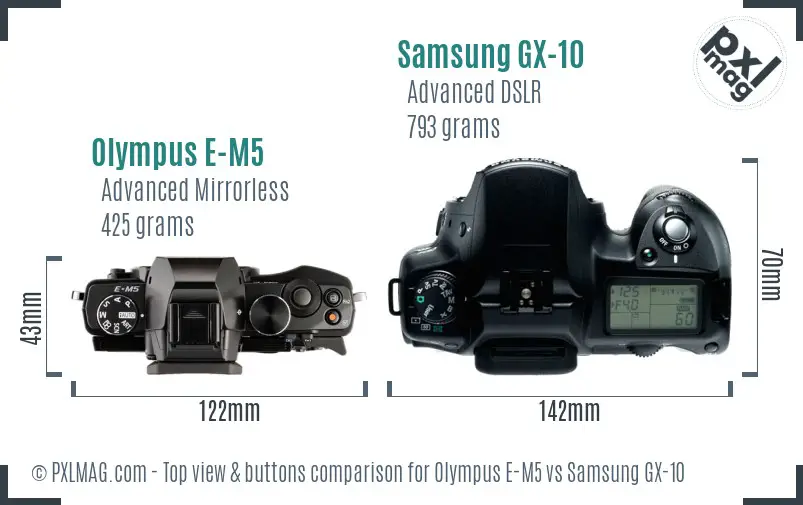 Olympus E-M5 vs Samsung GX-10 top view buttons comparison