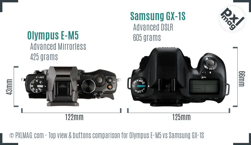 Olympus E-M5 vs Samsung GX-1S top view buttons comparison Olympus E-M5 vs Samsung GX-1S top view buttons comparison