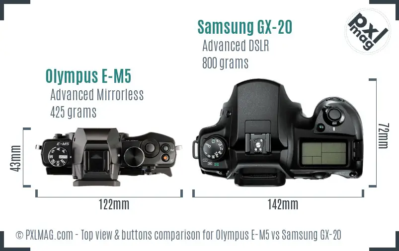 Olympus E-M5 vs Samsung GX-20 top view buttons comparison