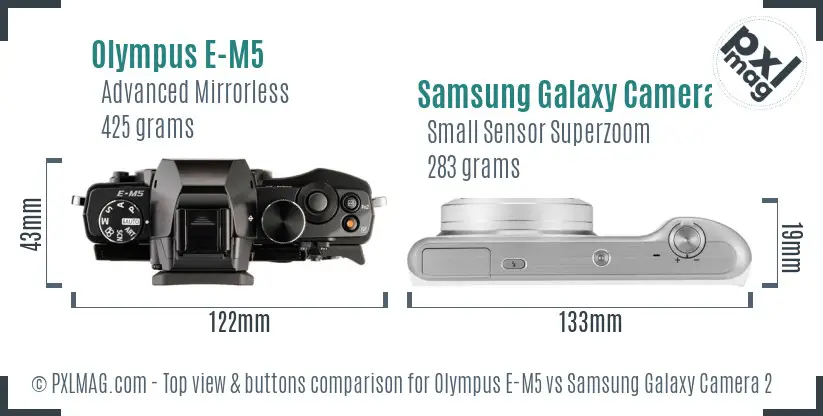 Olympus E-M5 vs Samsung Galaxy Camera 2 top view buttons comparison