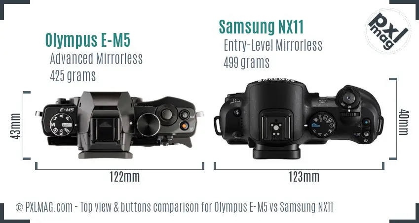 Olympus E-M5 vs Samsung NX11 top view buttons comparison