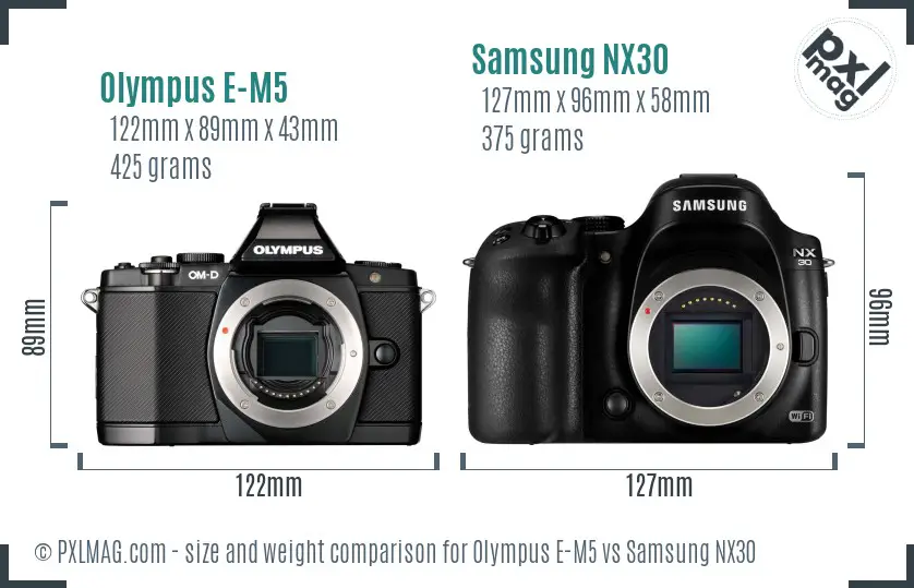 Olympus E-M5 vs Samsung NX30 size comparison Olympus E-M5 vs Samsung NX30 size comparison