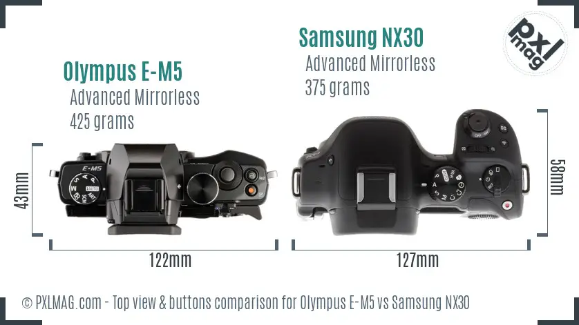 Olympus E-M5 vs Samsung NX30 top view buttons comparison Olympus E-M5 vs Samsung NX30 top view buttons comparison