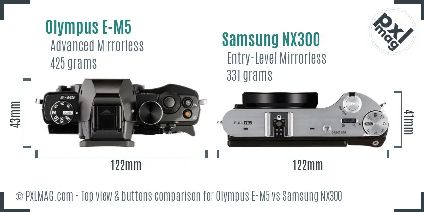 Olympus E-M5 vs Samsung NX300 top view buttons comparison
