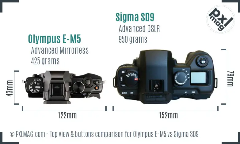 Olympus E-M5 vs Sigma SD9 top view buttons comparison