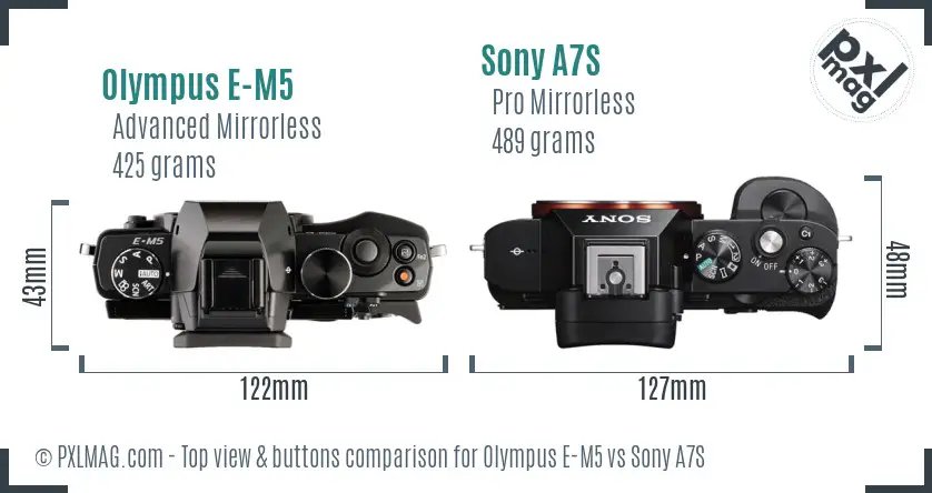 Olympus E-M5 vs Sony A7S top view buttons comparison