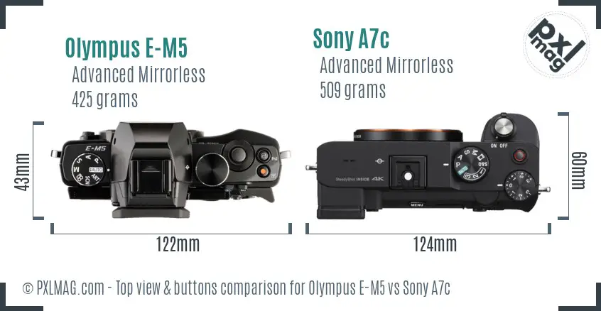 Olympus E-M5 vs Sony A7c top view buttons comparison