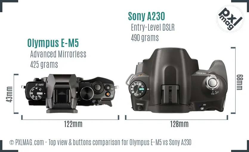 Olympus E-M5 vs Sony A230 top view buttons comparison