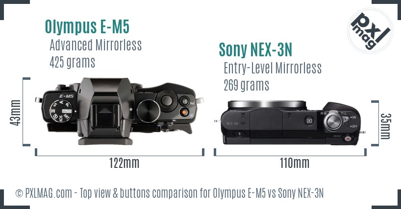 Olympus E-M5 vs Sony NEX-3N top view buttons comparison