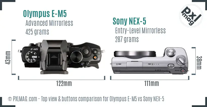 Olympus E-M5 vs Sony NEX-5 top view buttons comparison